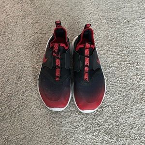 Kids Nike, tennis shoes in a size 4